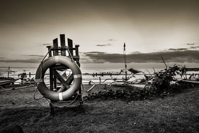 Beachfront lifeguard chair in sepia tone.