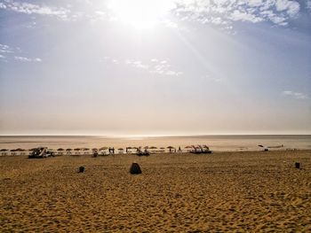 Scenic view of sea against sky on sunny day