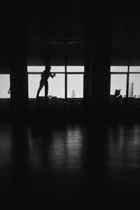 Silhouette of people in airport