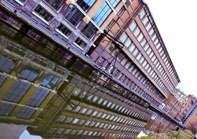 Low angle view of modern building against sky