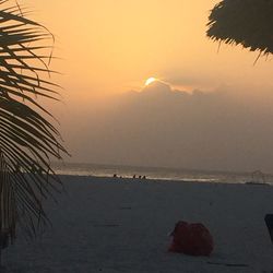 Scenic view of sea against sky at sunset