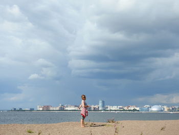 Beach view the gulf of finland clouds and city