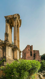 Ancient ruins in roman forum, rome, italy. colonnade and historical monuments.