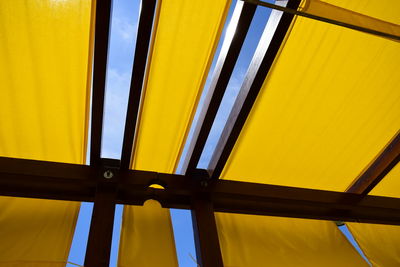 Low angle view of yellow window