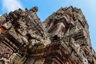 Low angle view of statue against sky