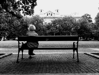 Woman relaxing on bench