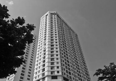 Low angle view of modern buildings against sky