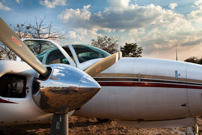 Close-up of airplane against sky