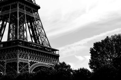 Low angle view of tower against cloudy sky