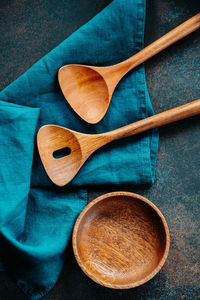 High angle view of blue bread on wooden table