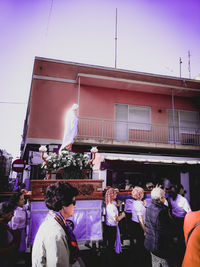 Group of people in front of building