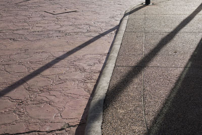 High angle view of shadow on street