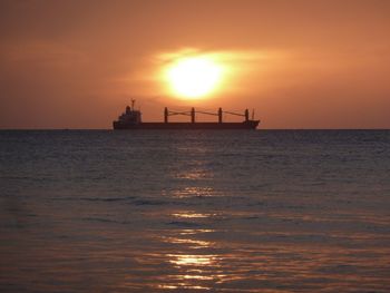 Scenic view of sea at sunset