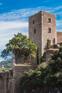 View of historic building against cloudy sky