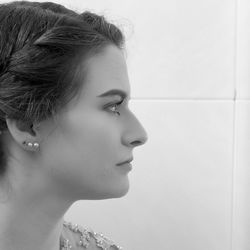 Side view of young woman looking away