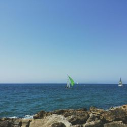 Boat sailing in sea