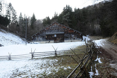 Built structure on snow covered land