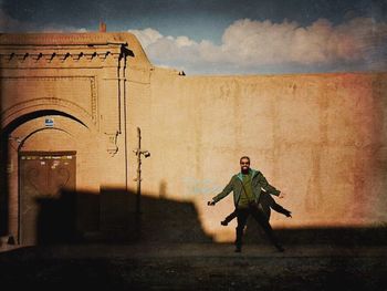 Silhouette of woman against clear sky