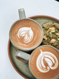 Close-up of cappuccino on table