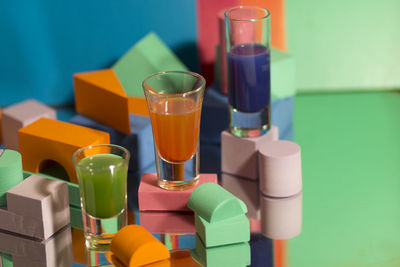 Close-up of drinking glasses on table