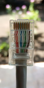 Close-up of multi colored glass on table