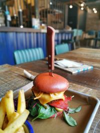 Close-up of burger in plate on table