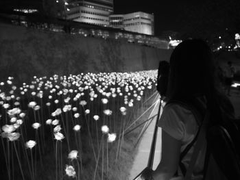 Full length of woman standing at night