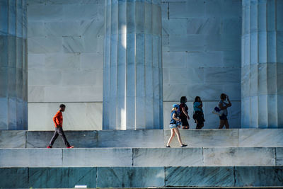 People walking in modern building