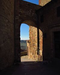 Archway of building against clear sky