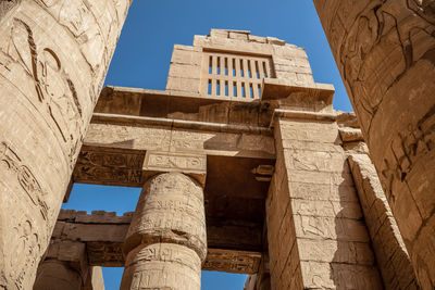 Different hieroglyphs on the walls and columns in the karnak temple.