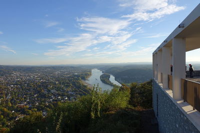 High angle view of buildings and trees against sky