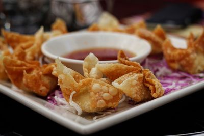 Close-up of serving food in plate