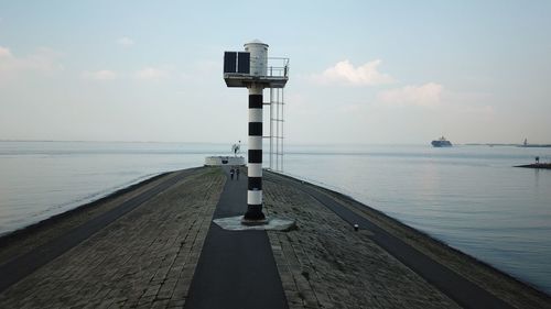 Pier on sea against sky