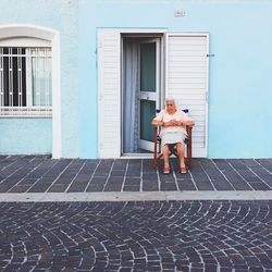 Girl in front of building