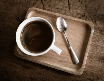 High angle view of coffee cup on table