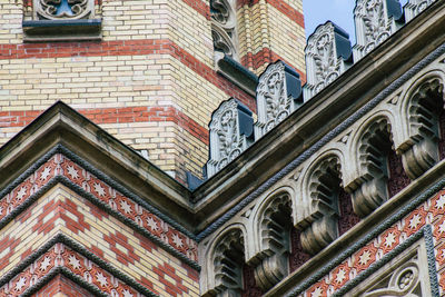 Low angle view of ornate building against sky