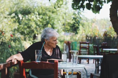 Man sitting on table at restaurant