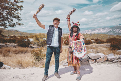 Representation of inca warrior dressed and with battle, prehispanic fighting with a tourist in peru