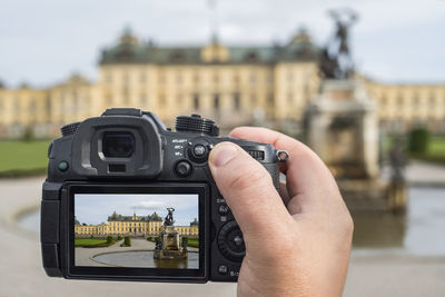 Drottningholm palace on camera screen, drottningholm, sweden