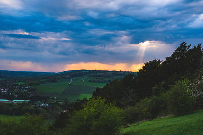 Scenic view of landscape against sky during sunset