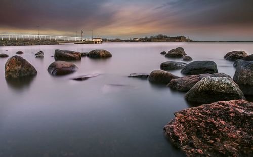 Scenic view of sea at sunset