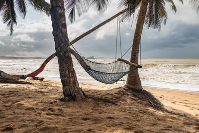 Africa beach with a hammock and a hanging swing