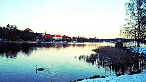 Scenic view of lake against clear sky