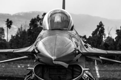 Military airplane against sky