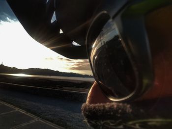 Close-up of car against sky