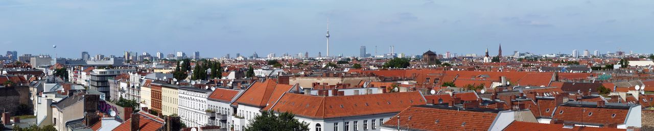 Panoramic view of cityscape against sky