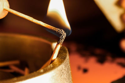 Close-up of burning candle