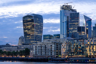 Modern buildings in city at dusk