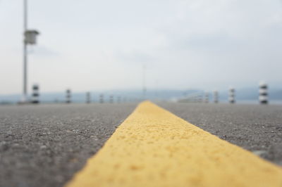 Surface level of road against sky