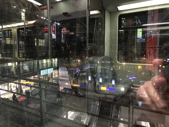 High angle view of vehicles on city street at night